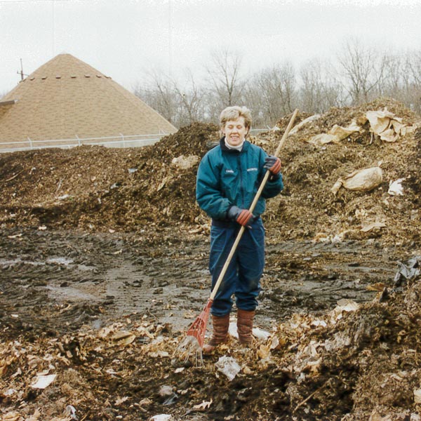 an old image of caroline repenning in the mulch yard